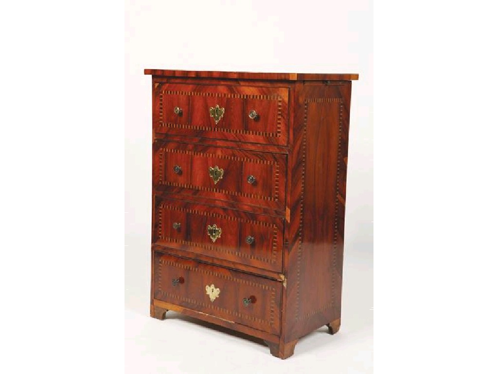 Appraisal: A CONTINENTAL WALNUT CHEST OF DRAWERS of small proportions inlaid