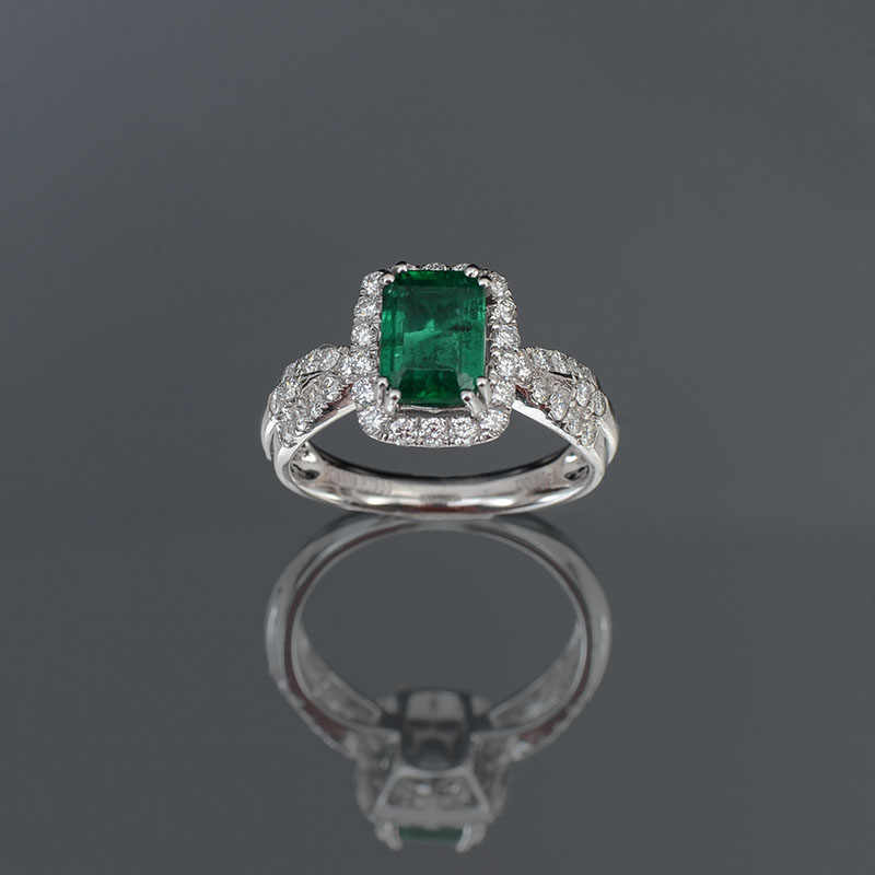 Appraisal: EMERALD WITH DIAMONDS SET IN PLATINUM RING CT rectangular step