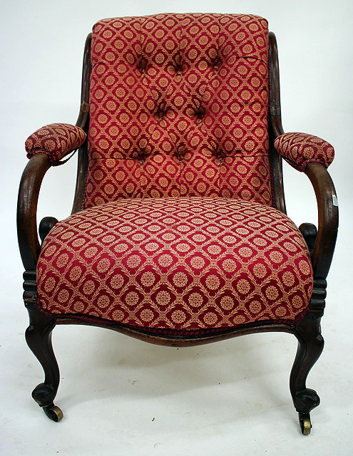 Appraisal: A VICTORIAN MAHOGANY BUTTON BACK LIBRARY ARMCHAIR with shepherd crook