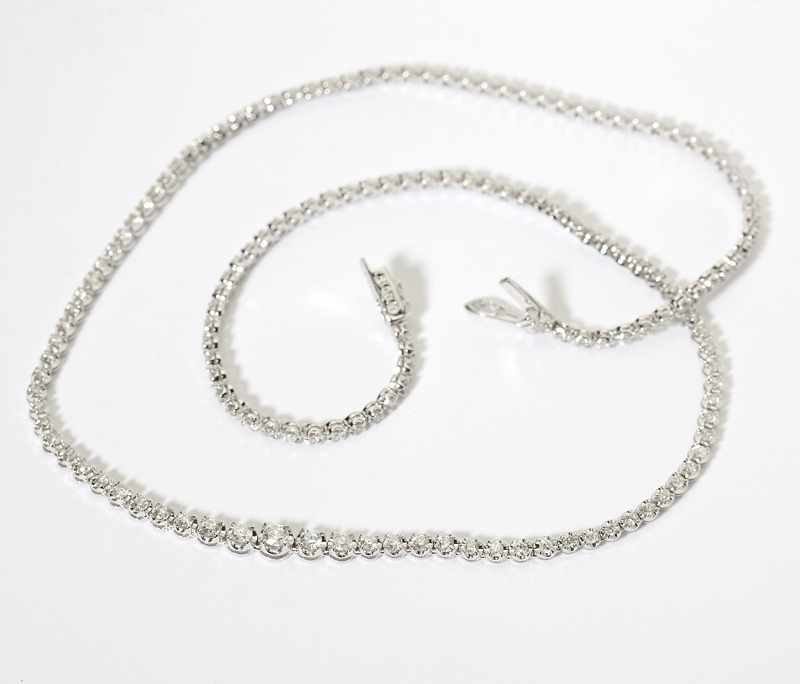 Appraisal: A white gold and graduated diamond necklace K white gold