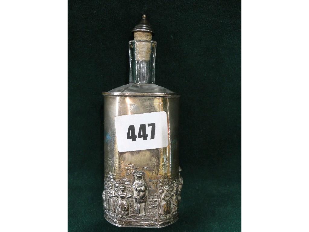 Appraisal: A glass perfume bottle with silver mounted sleeve with embossed