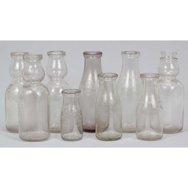 Appraisal: Set of Embossed Polk Milk and Cream Top Bottles in