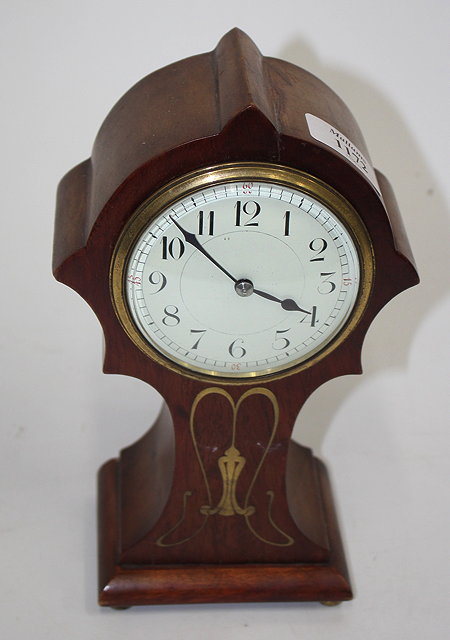 Appraisal: AN EDWARDIAN MAHOGANY MANTLE TIMEPIECE with shaped case and brass