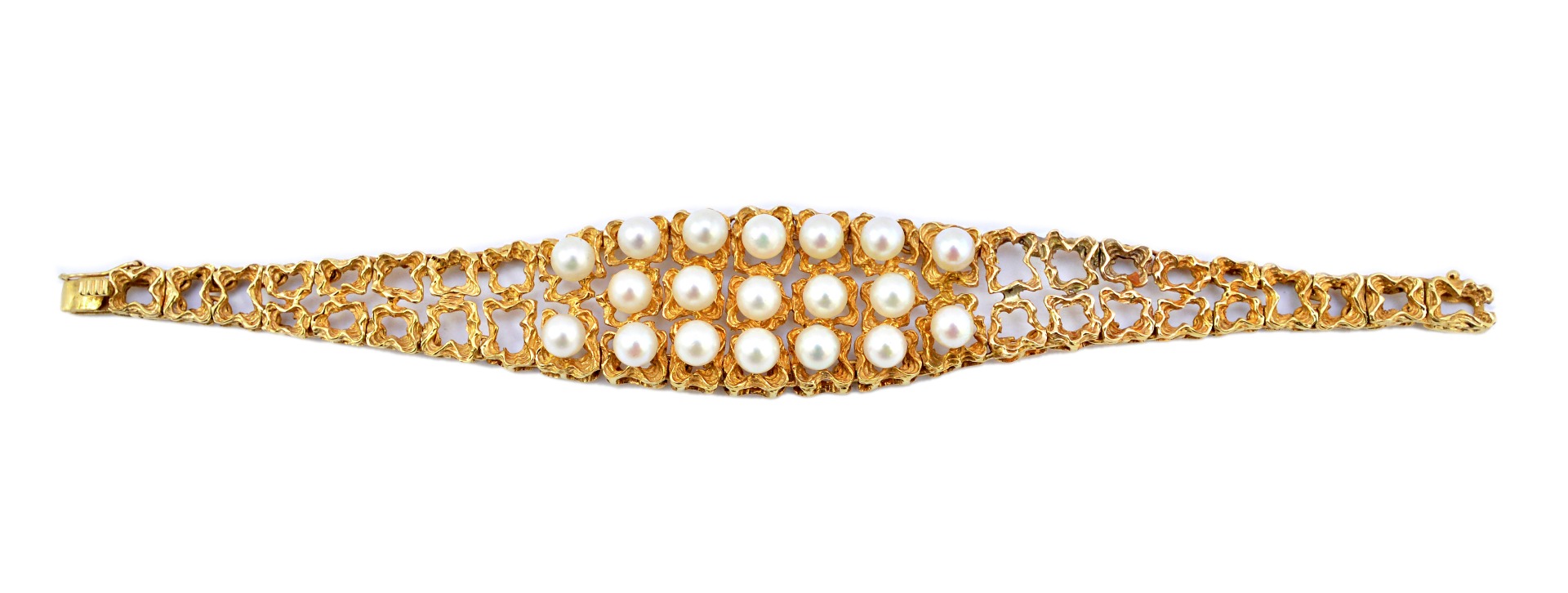 Appraisal: A gold and cultured pearl bracelet cast and pierced in