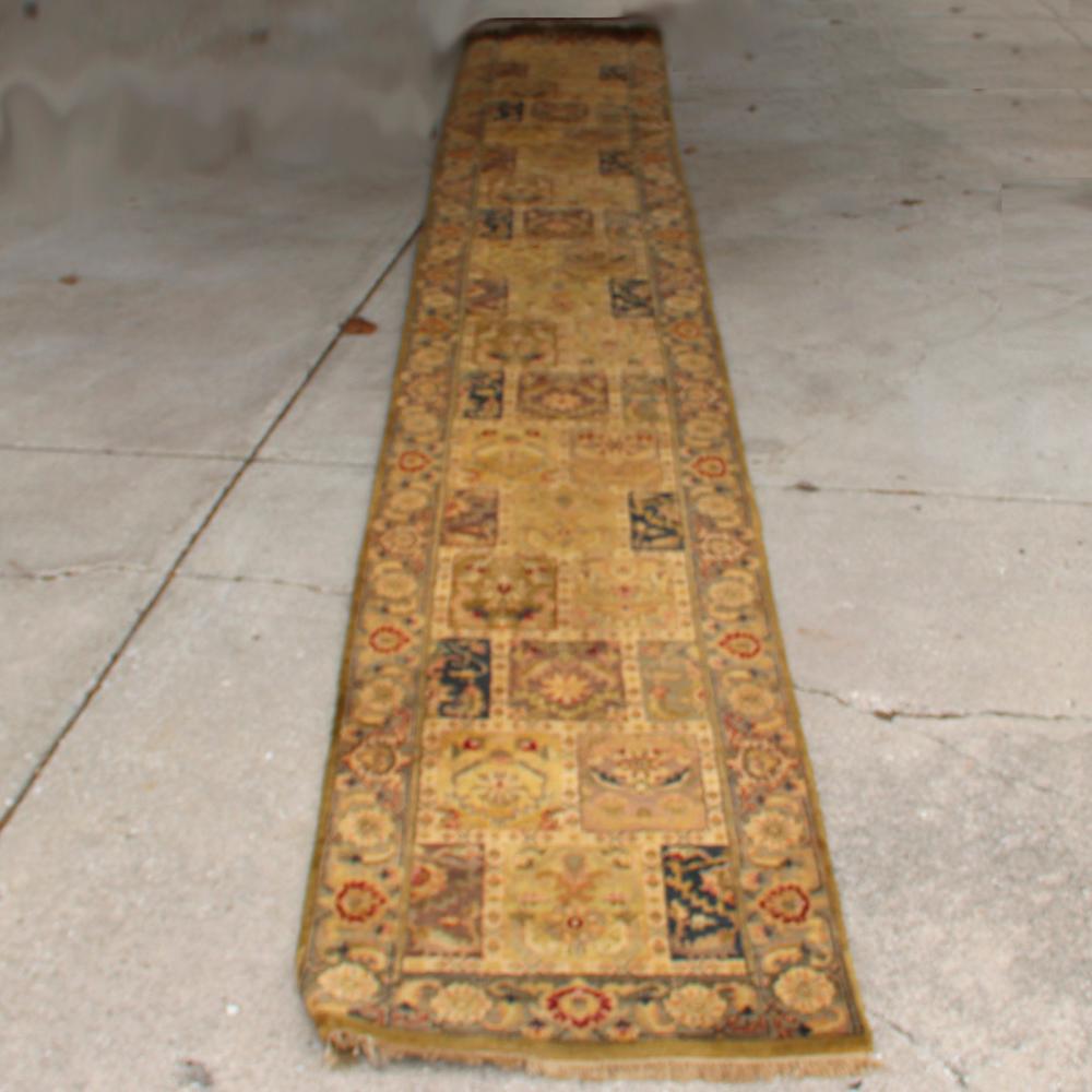 Appraisal: INDIA AGRA ESTATE ECRU AND OLIVE WOOL ESTATE CARPET RUG