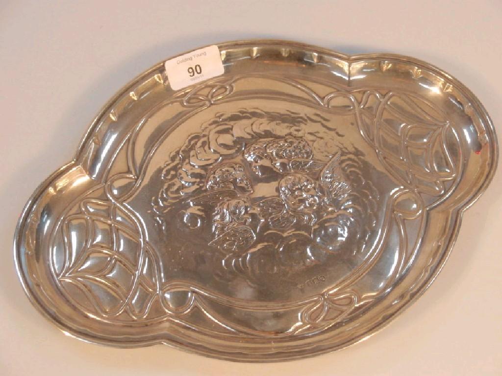 Appraisal: An Edwardian silver dressing table tray of quatrefoil form embossed