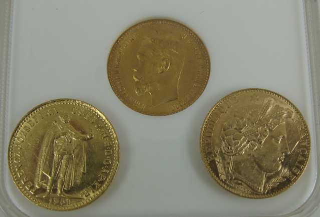 Appraisal: THREE FOREIGN GOLD COINS Russian five roubles NGCA graded MS