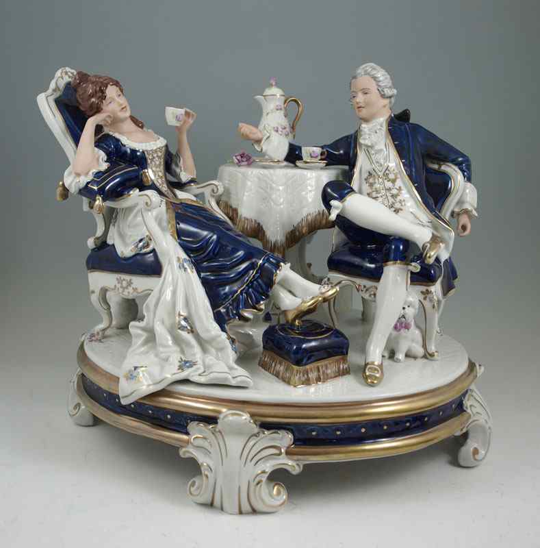 Appraisal: LARGE ROYAL DUX PORCELAIN FIGURAL GROUP Cobalt and gold glazed