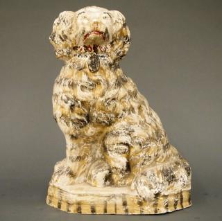 Appraisal: Large chalkware dog A late th century chalkware dog with