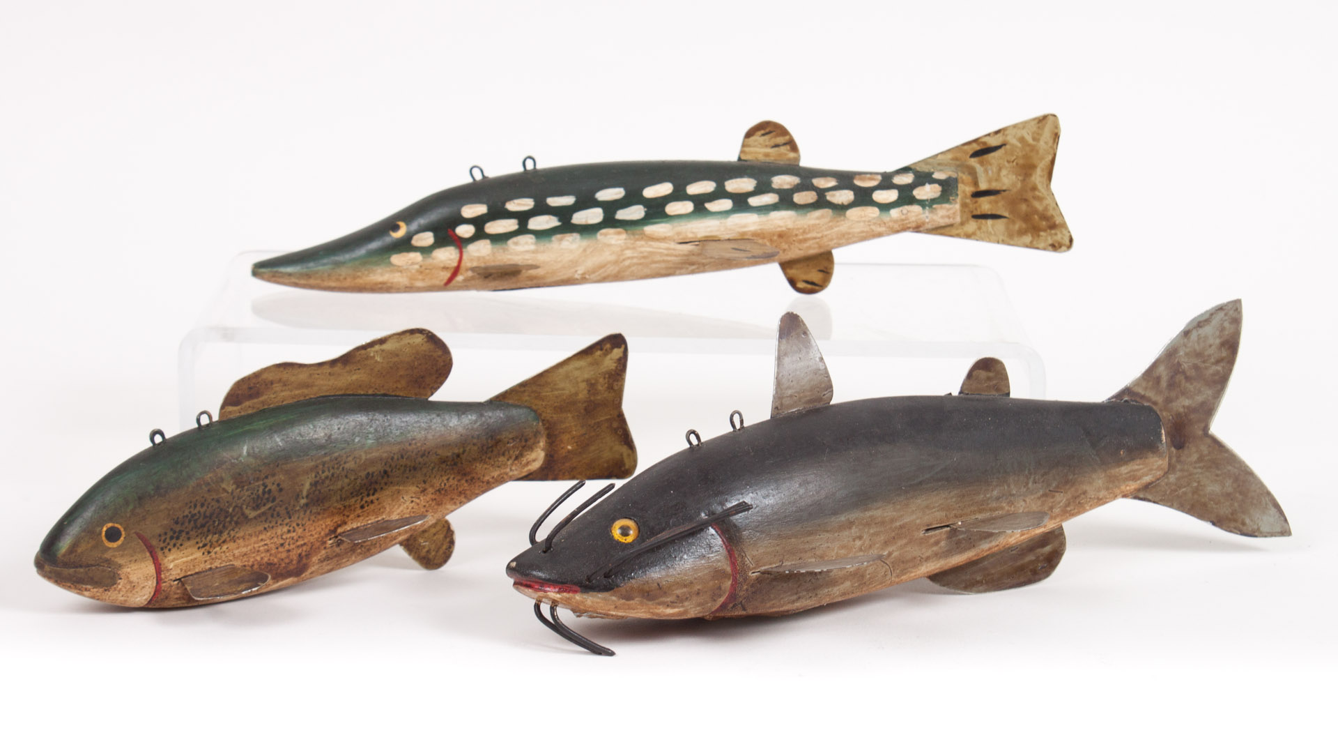 Appraisal: Three carved and painted wood fish decoys th century each