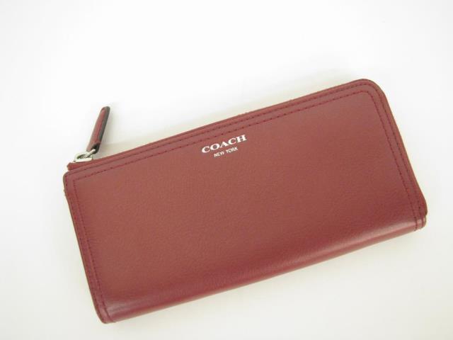 Appraisal: Coach zip accordion wallet in Saffiano red leather Zipper opens