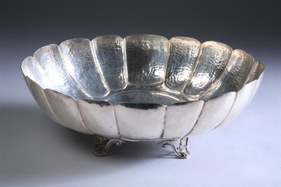 Appraisal: HAND-FORGED STERLING SILVER CENTERBOWL th century Oval hammered lobed panels