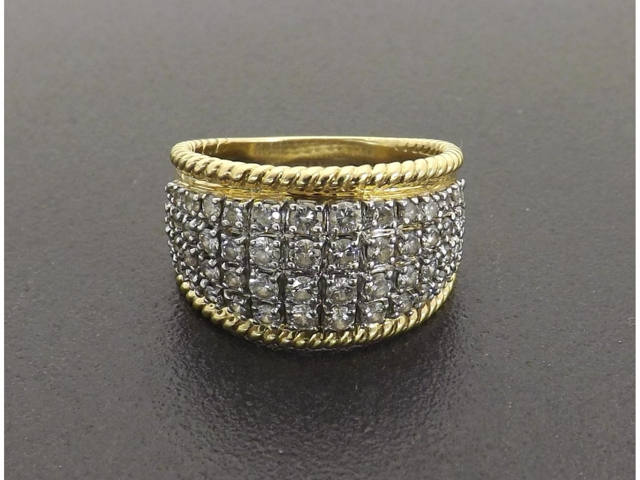 Appraisal: ct yellow and white gold diamond band ring round brilliant-cut