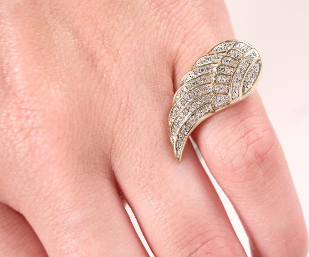 Appraisal: New with tag sterling silver gold plated angel wing ring