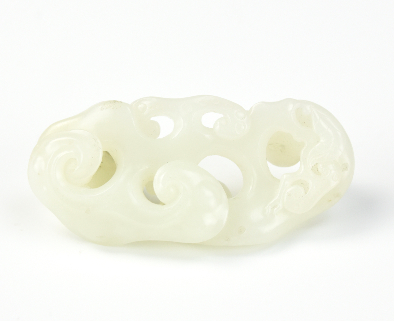 Appraisal: CHINESE CARVED WHITE JADE LINGZHI ORAMENT Chinese carved in the