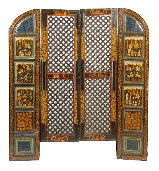 Appraisal: A pair of pair of Persian carved and polychrome painted