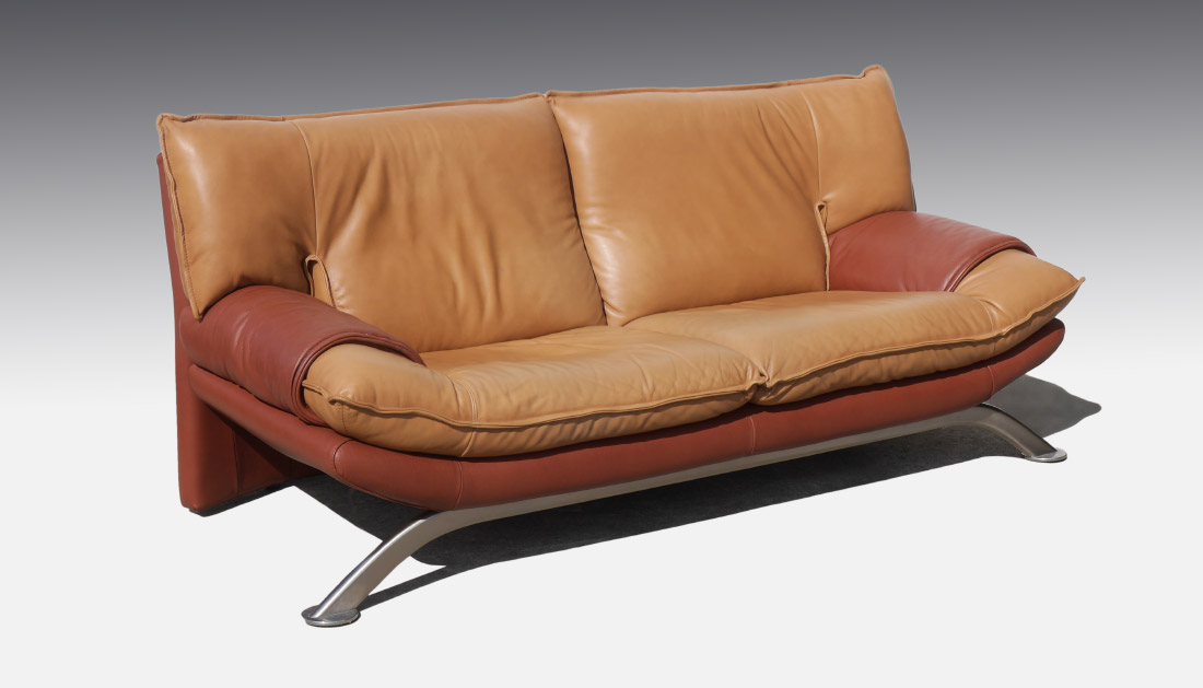 Appraisal: NICOLETTI ITALIAN LEATHER SOFA Two tone leather with metal legs