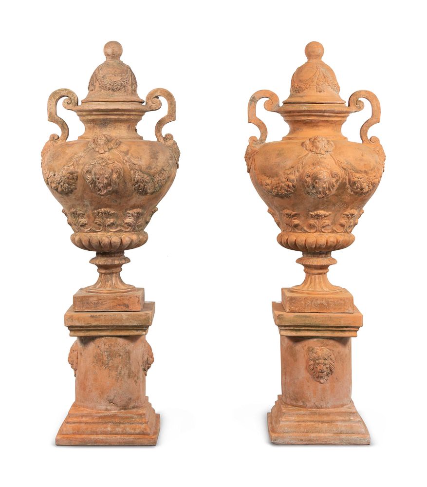 Appraisal: A Large Pair of Neoclassical Terra Cotta Covered Urns on