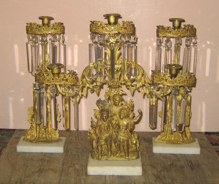 Appraisal: VICTORIAN GILT METAL CANDELABRUM GARNITURE Three-piece set comprising three-light candelabrum