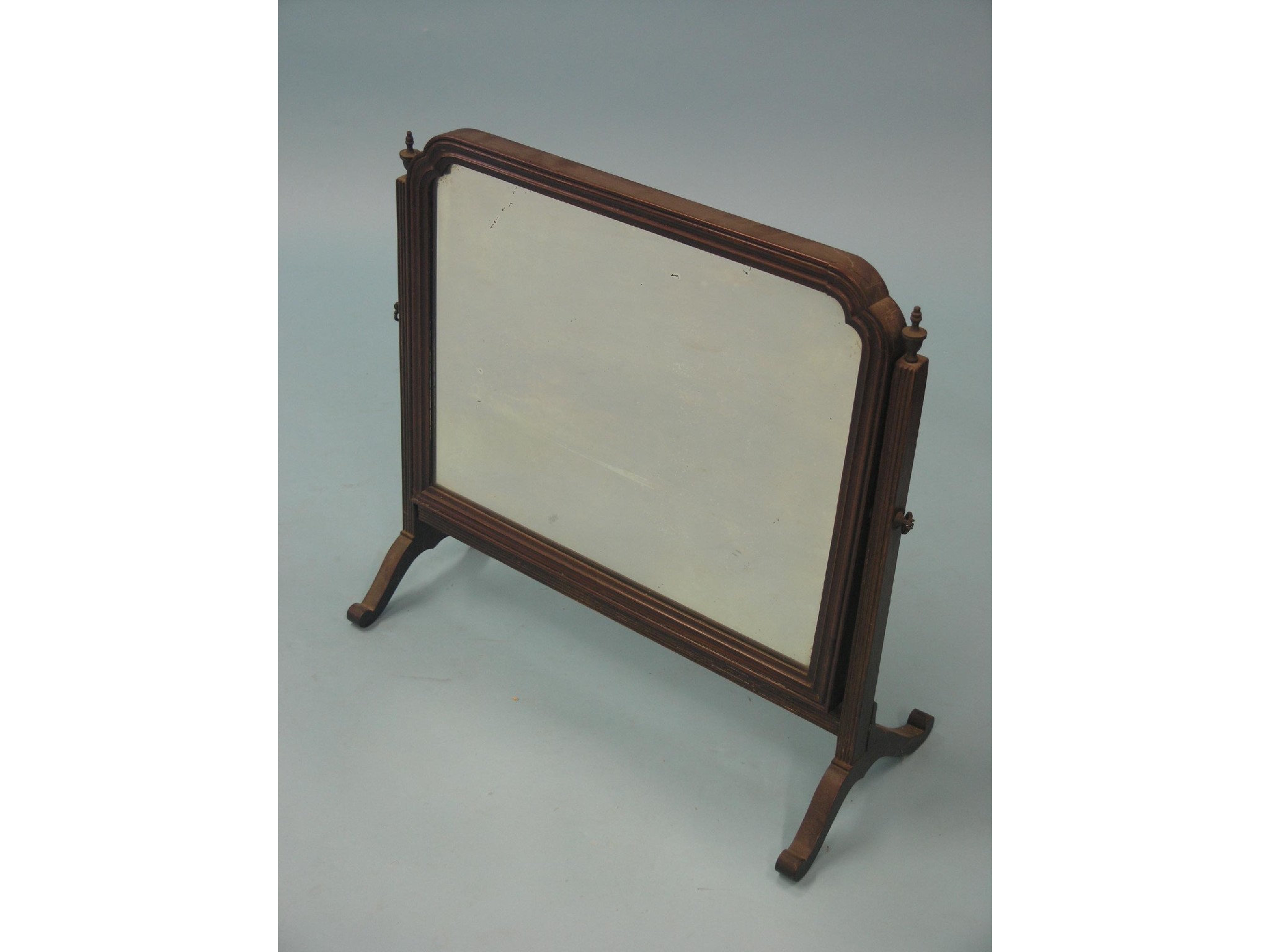 Appraisal: A Georgian-style mahogany toilet mirror arched rectangular frame ft in