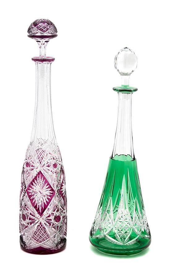 Appraisal: Two Baccarat Color Cut-to-Clear Crystal Decanters Height of taller inches