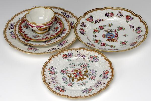 Appraisal: FRENCH ARMORIAL CHINA Sixty-four pieces including cups saucers soup bowls