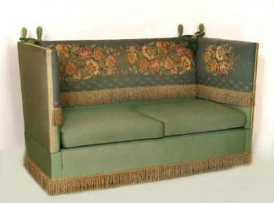 Appraisal: A KNOLL SOFA th century with drop down ends and