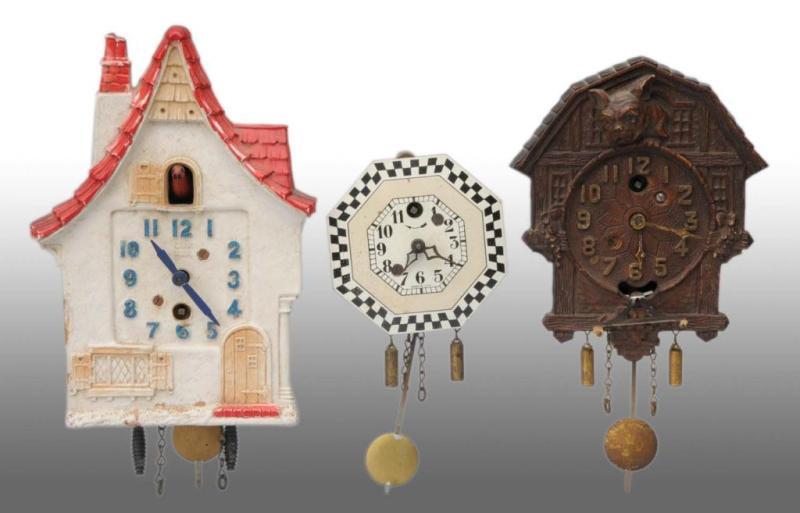 Appraisal: Lot of Miniature Figural Novelty Clocks Description Includes the Enchanted