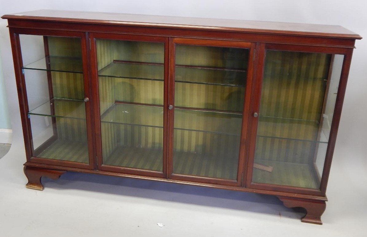 Appraisal: An early thC mahogany shop display cabinet with various shelves