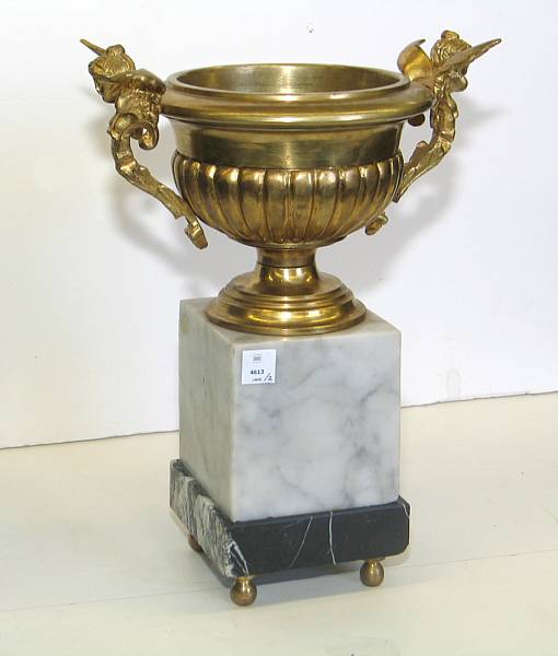 Appraisal: A pair of Empire style brass and marble urns on