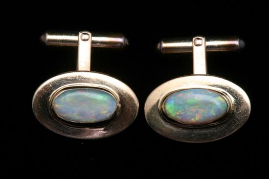 Appraisal: PAIR HAND-CRAFTED K YELLOW GOLD AND PRECIOUS WHITE OPAL CUFFLINKS