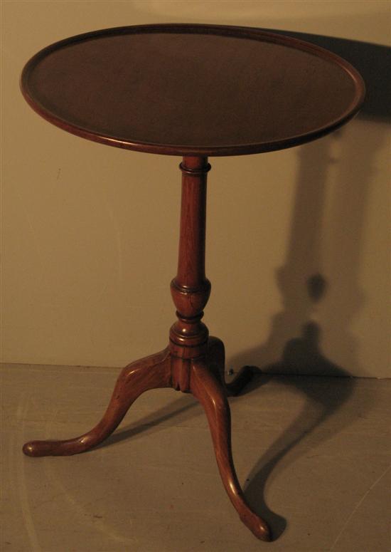 Appraisal: George III mahogany round table with turned column support and