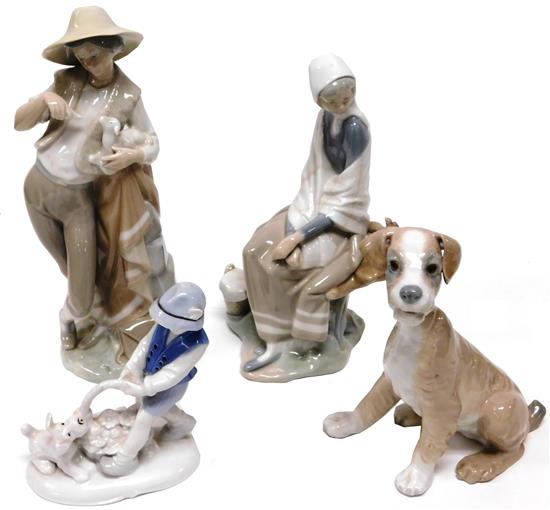 Appraisal: Four porcelain figurines three Lladro all marked on base girl