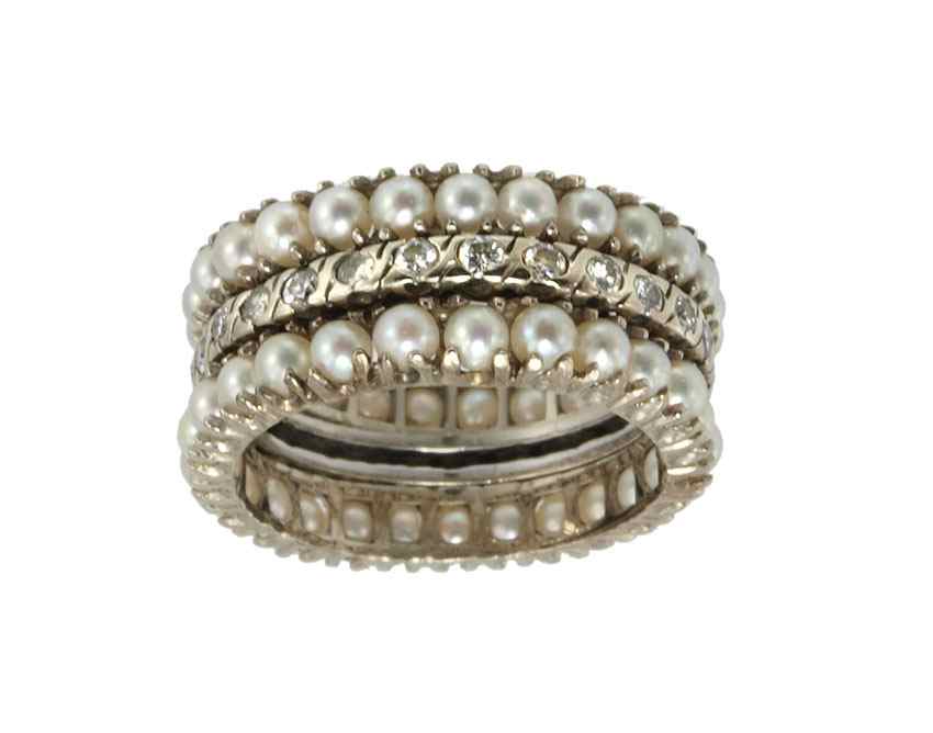 Appraisal: THREE K PEARL AND DIAMOND BANDS Three K white gold