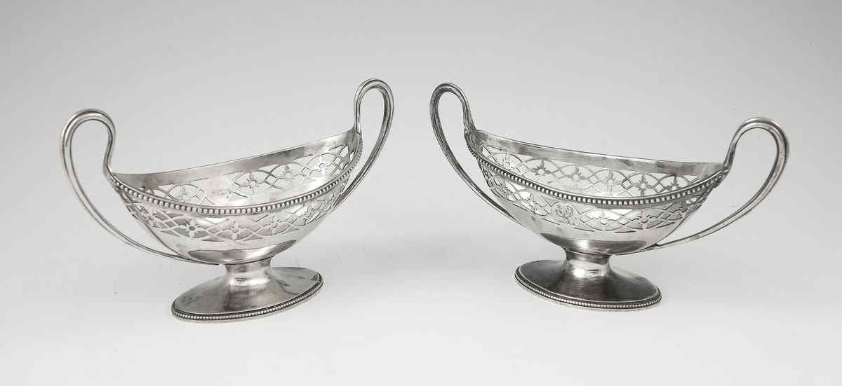 Appraisal: PAIR GEORGIAN ENGLISH STERLING RETICULATED MASTER SALTS Each marked London