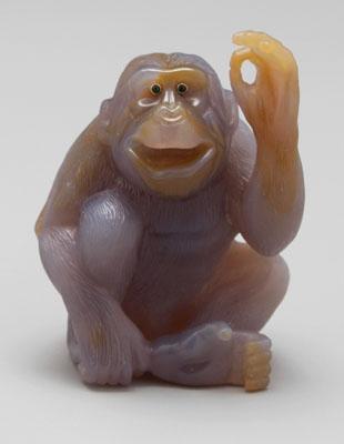 Appraisal: Carved agate ape realistically carved adult ape smiling and waving