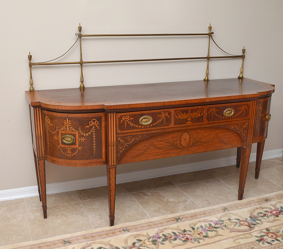 Appraisal: INLAID HEPPLEWHITE SIDEBOARD Double brass rails with urn finials over