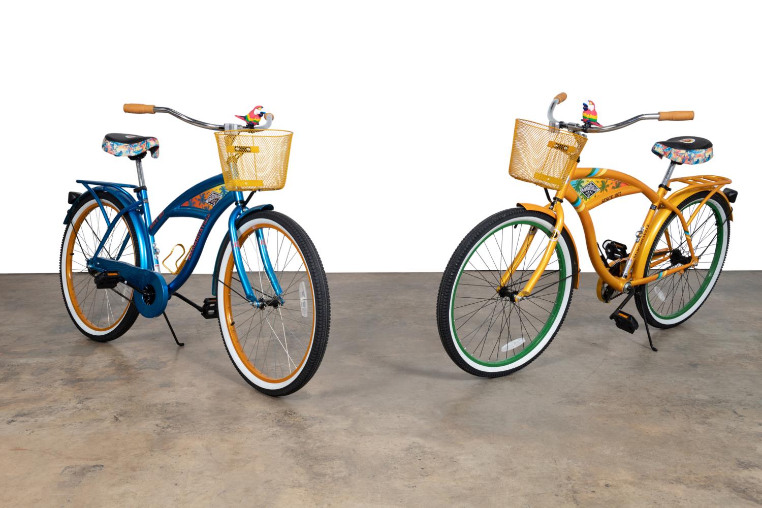 Appraisal: MARGARITAVILLE CRUISER BIKES YELLOW BLUE Two Jimmy Buffett Margaritaville men's