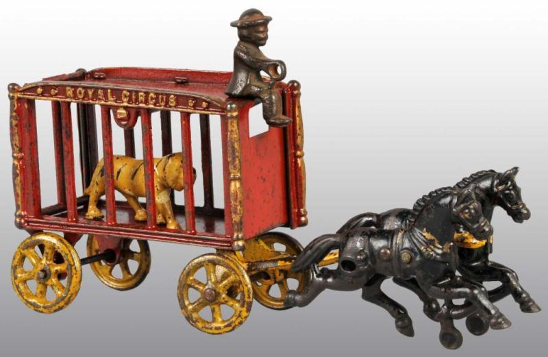 Appraisal: Cast Iron -Horse Royal Circus Cage Wagon Toy Description All