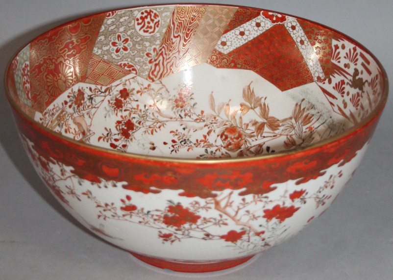 Appraisal: A thC Japanese Kutani punch bowl of large proportion typically