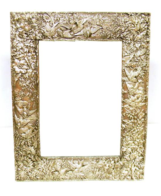 Appraisal: STERLING silver framed dressing mirror rectangular with bas relief decoration