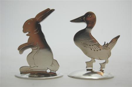 Appraisal: A pair of novelty animal menu holders by S Morden