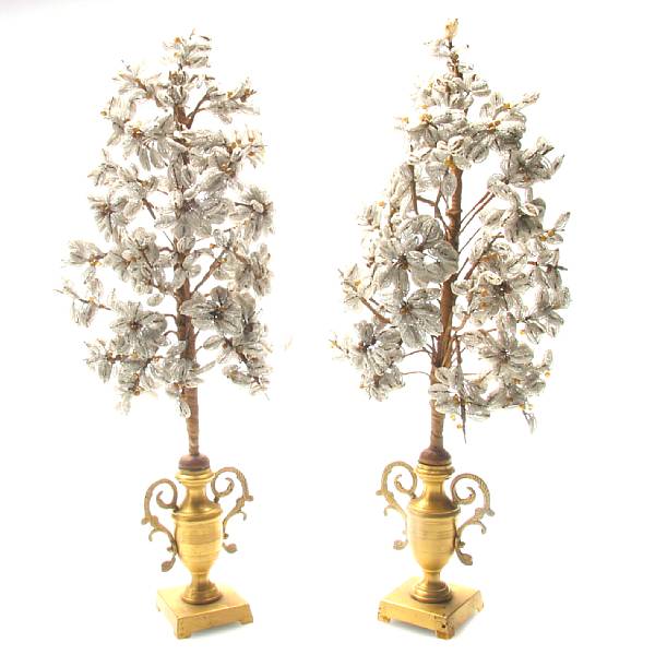 Appraisal: A pair of gilt metal and glass table ornaments height