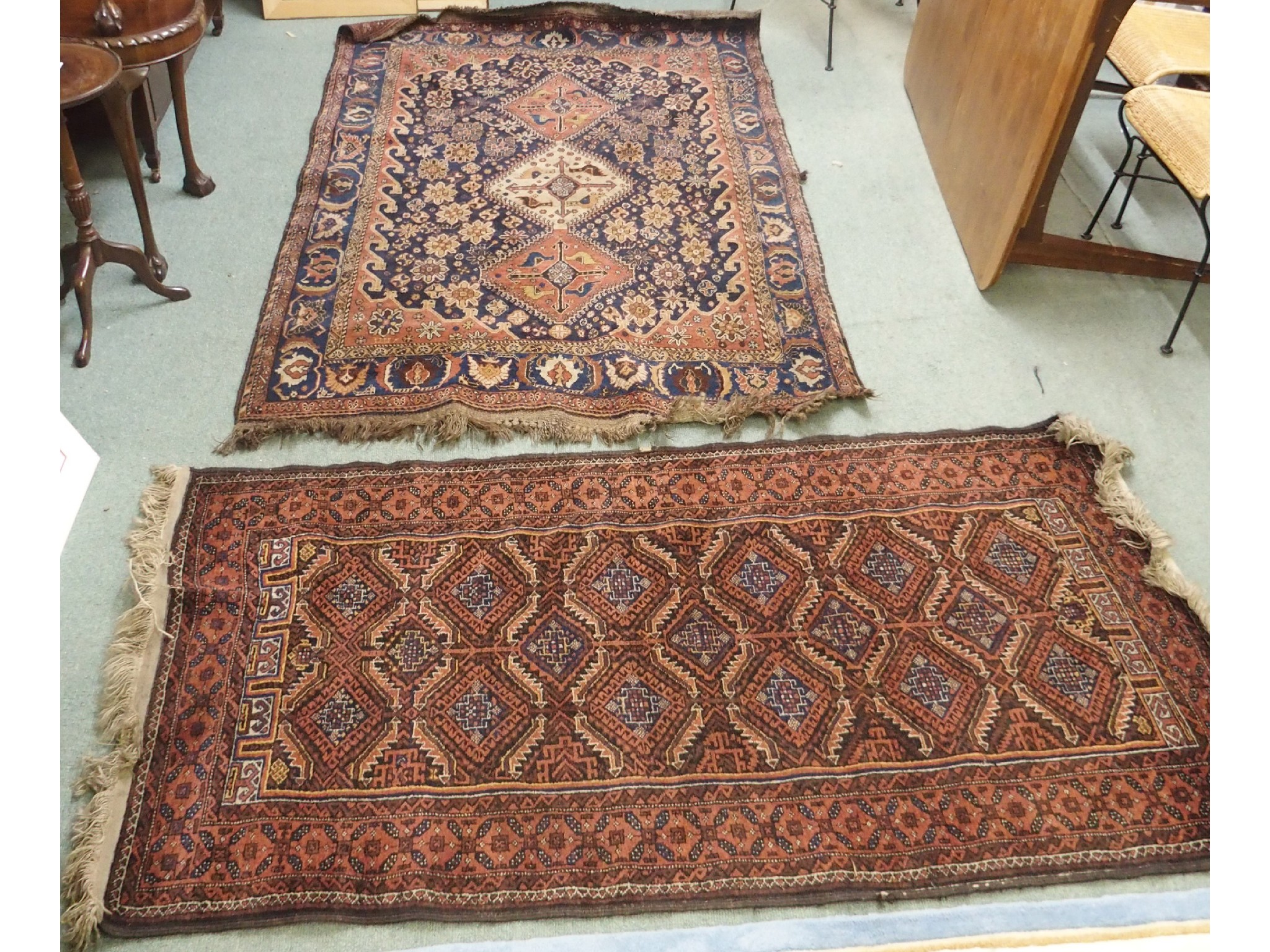 Appraisal: Two rugs x cm and x cm def