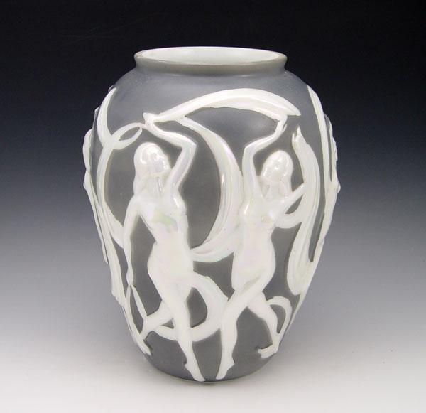 Appraisal: CONSOLIDATED GLASS DANCING NUDE VASE High luster white figures on