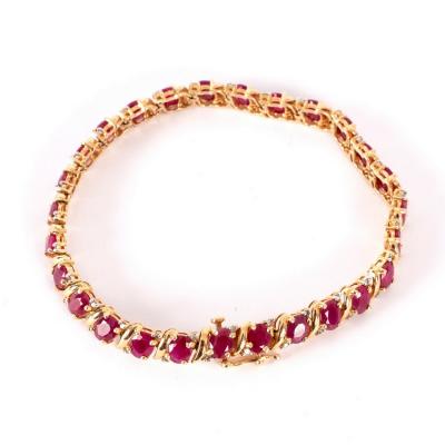 Appraisal: A ruby and diamond bracelet set in k yellow gold