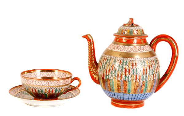 Appraisal: A tea set depicting Rakan comprising a teapot creamer sugar