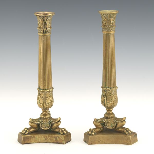 Appraisal: FRENCH EMPIRE PAIR OF ORMOLU BRONZE TRIPOD CANDLESTICKS Slightly tapered