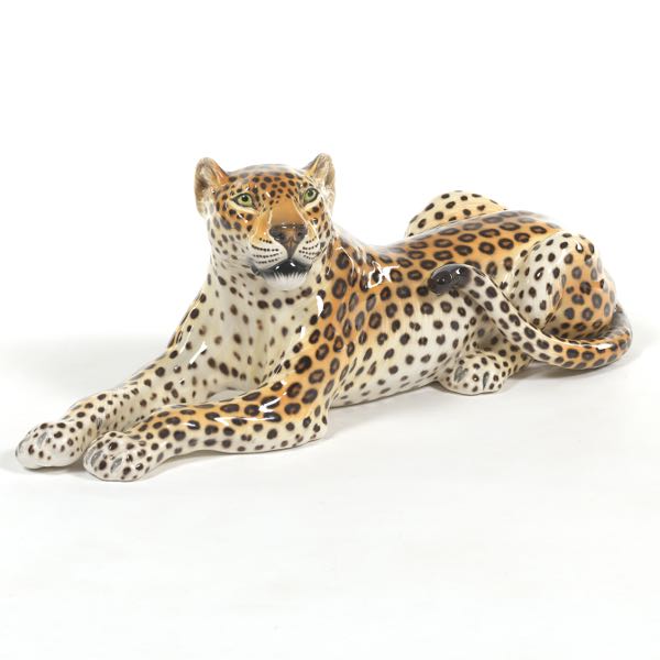 Appraisal: MAJESTIC RECUMBENT LEOPARD PORCELAIN SCULPTURE x x Lifelike porcelain sculpture