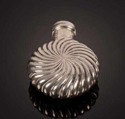 Appraisal: A Victorian circular silver scent bottle Samuel Mordan with ribbed